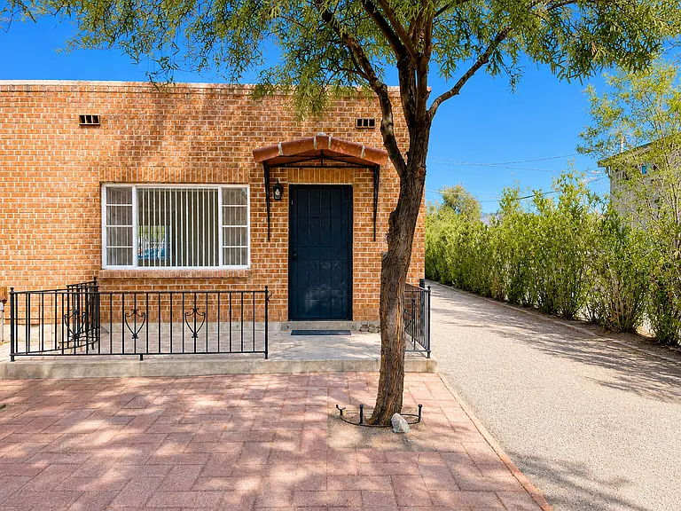 Front of unit with shade from Mesquite Tree