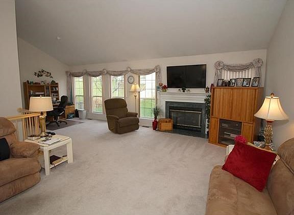 Vaulted great room with gas fireplace!