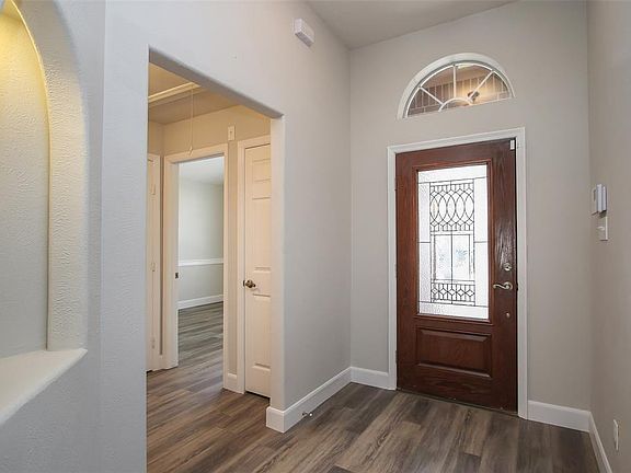 To the right of the entry are the two secondary bedrooms with a shared hall bath.