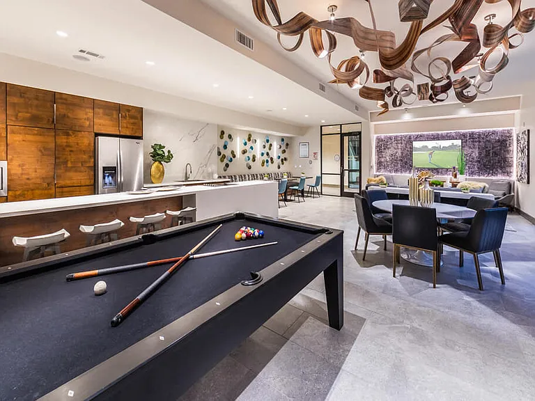The Collective is Inwood Station's resident lounge complete with gourmet kitchen, billiard and shuffleboard tables.