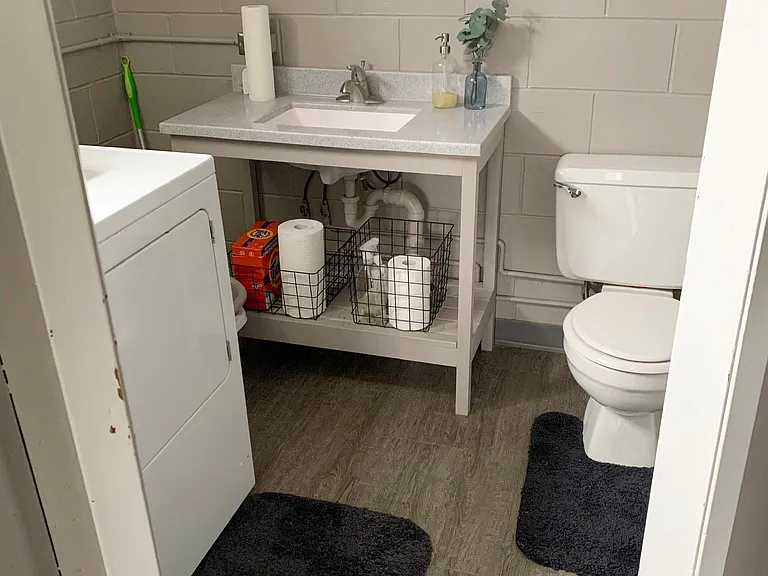 Lower level half bath and laundry