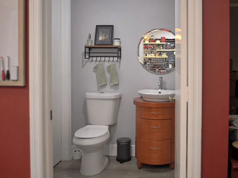 Downstairs 1/2 Bathroom with Storage Closet