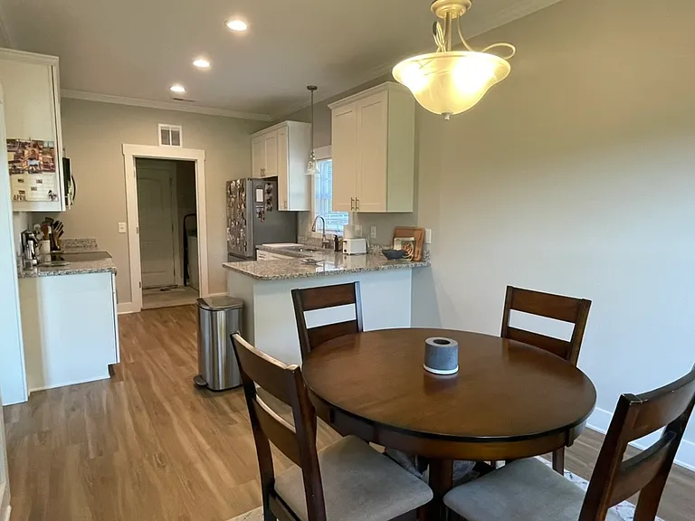 Dining area looking into kitchen