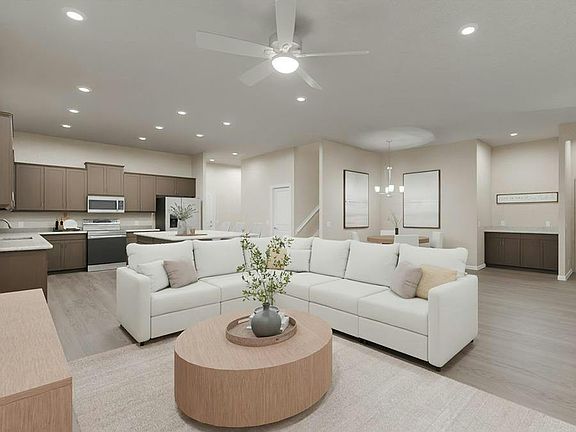 Inside, enjoy a spacious, open living area with airy 10-foot ceilings on the main level. Artist s r