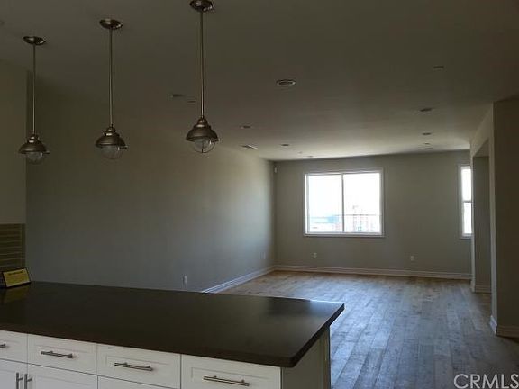 Open floor plan w wood flooring