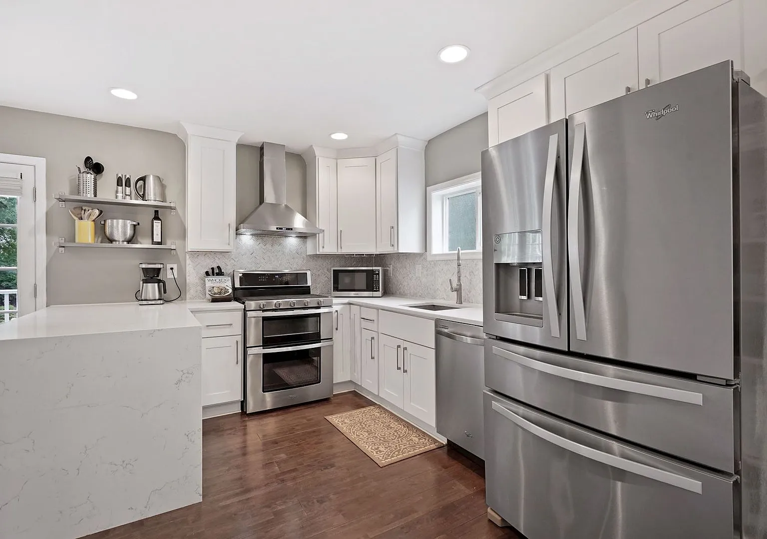 Renovated Cape Cod with Den, Garage, Driveway & Spacious Backyard — Photo 1