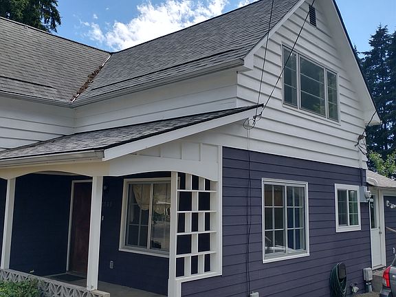 Large covered porch and plenty of parking