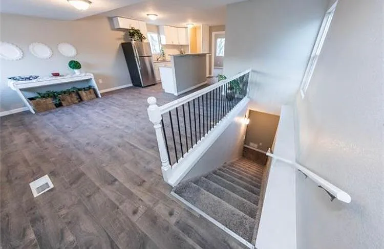 Living room, kitchen, stairs to basement