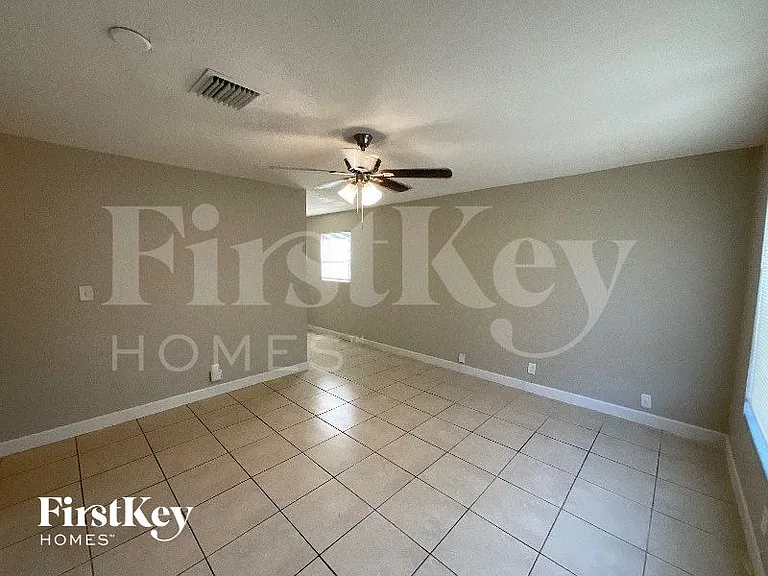5980 NW 24th Ct — Photo 2
