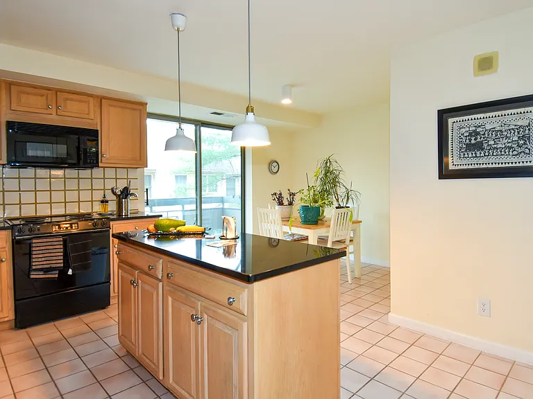 5450 Whitley Park Ter #212 — Photo 7