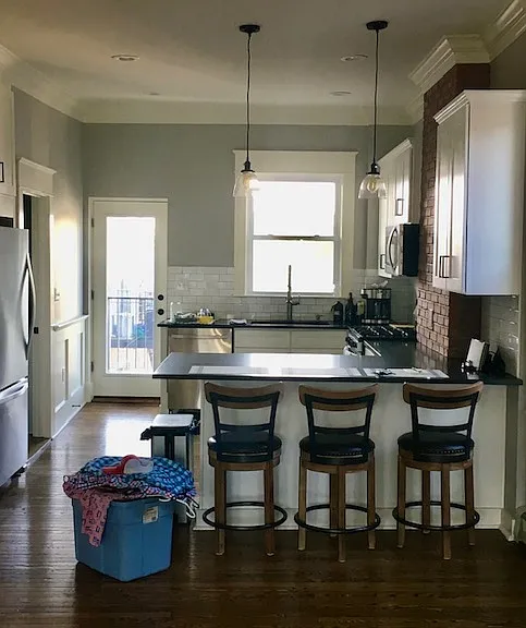 Open-concept living & kitchen with 10" ceilings.