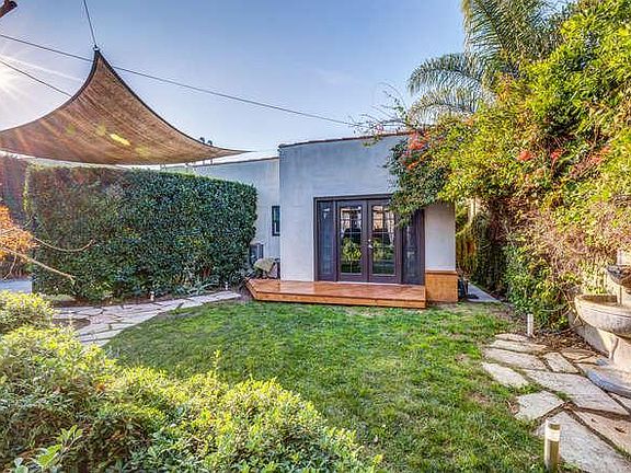 Backyard looking towards the master bedroom with deck