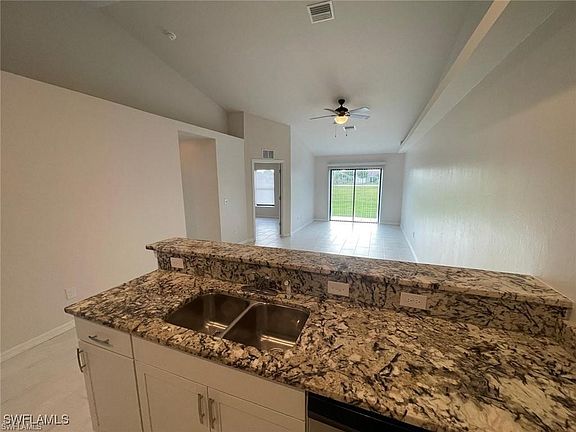 5th image of 4332/4334 Santa Barbara Blvd