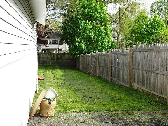 Level, usable back yard.  Completely fenced in yard.