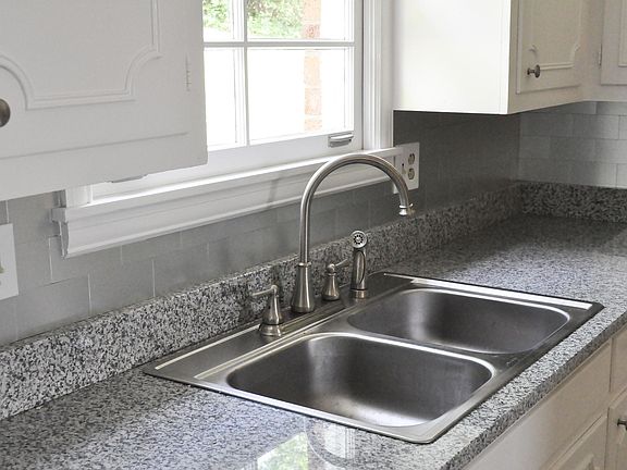 New granite tops, new sink and fixtures