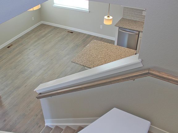 High ceilings and tons of light to dining room