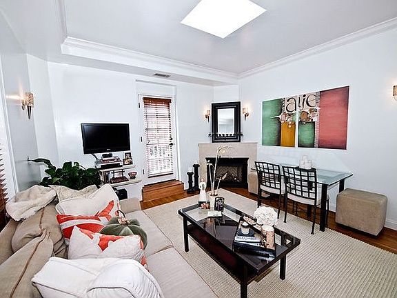  LIVING/DINING ROOM WITH SKYLIGHT 