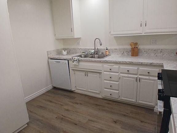 Kitchen / pantry in the corner and loads of cabinets