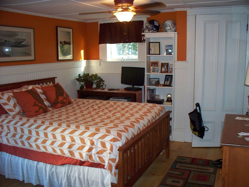 Great light w/ 3 windows, custom shelving & moulding