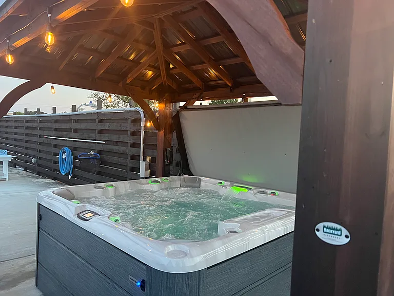 Hot tub in community pool area