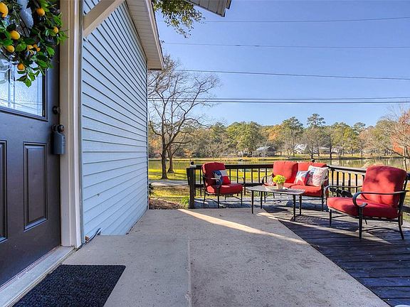 Another view of the front porch with the lake in the background.