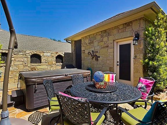Enjoy Privacy & Outdoor Living in your Courtyard w High Stone Wall with Decorative Accents!