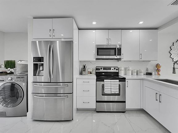 2nd image of 9962 Royal Palm Boulevard #9962