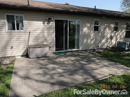 Back cement patio
						:
						Sliding glass doors to backyard patio and large fenced-in backyard.