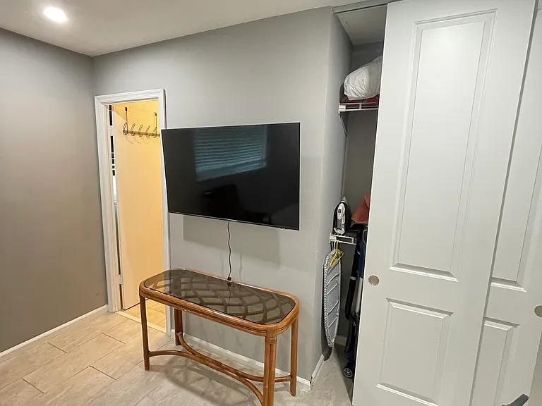 Master bedroom with sliding closet