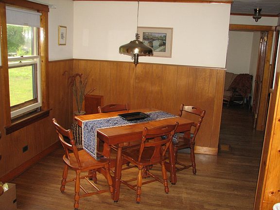 Dining area with original hardwood floors