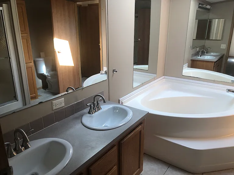 Master Bathroom with tile floor and updated fixtures.