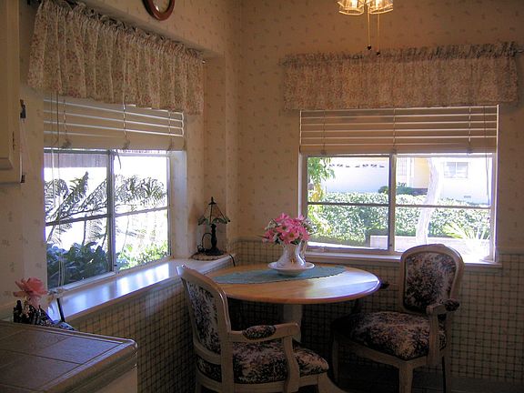 The breakfast area has lots of light and overlooks the front yard. 