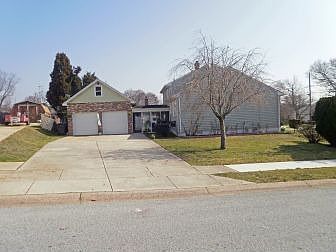 Side entry 2 car garage and breezeway/porch