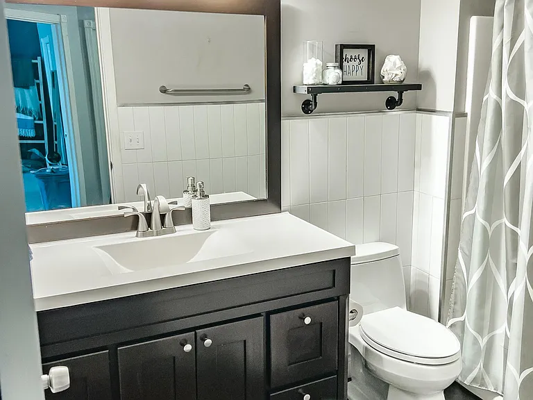 Upper level full bathroom. Extra tall vanity and modern finishes!