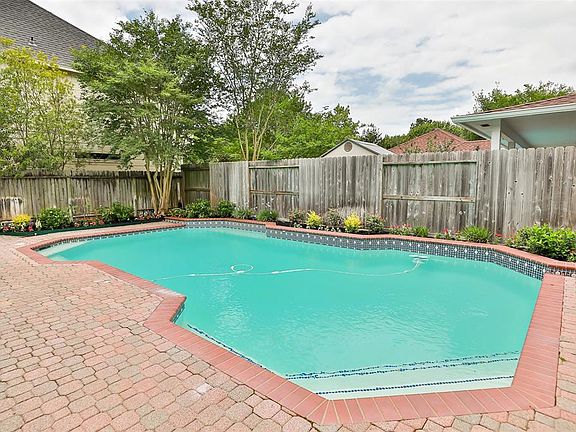 Beautiful back yard & pool. Professionally landscaped May 2019. Whisper pool pump & attached pipes replaced 2018. Filter unit replaced 2017. Refurbished Polaris 2018. Skimmer screens 2016.