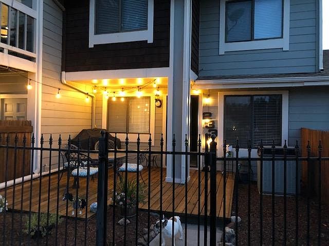 Front door and patio. Fenced in.