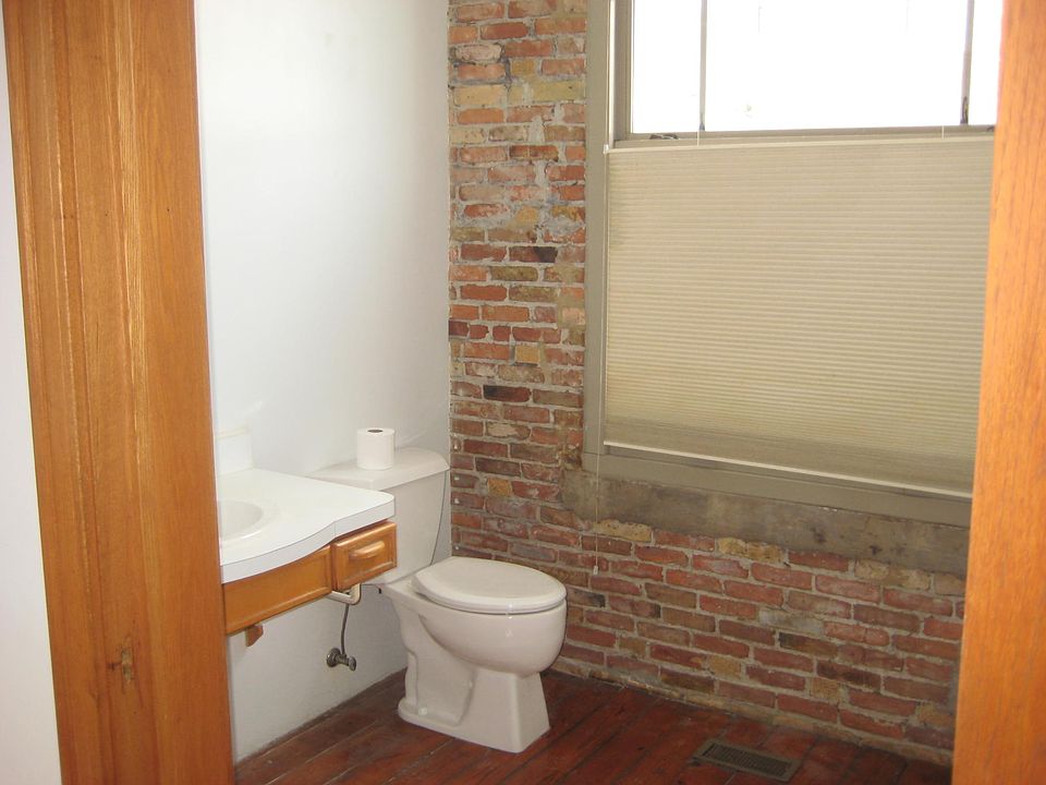 Bathroom with sink, shower, toilet