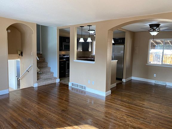 Newly refinished hardwood floors, arched entries, fresh paint!