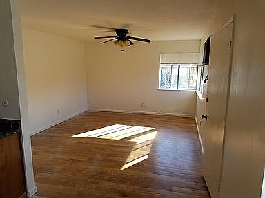 This is the living room with the front door on the right.