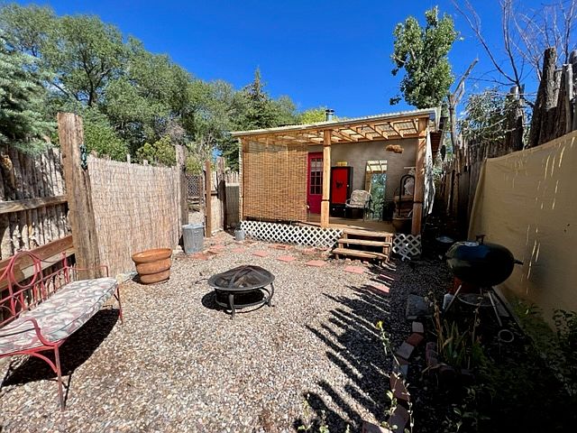enclosed patio with small yard