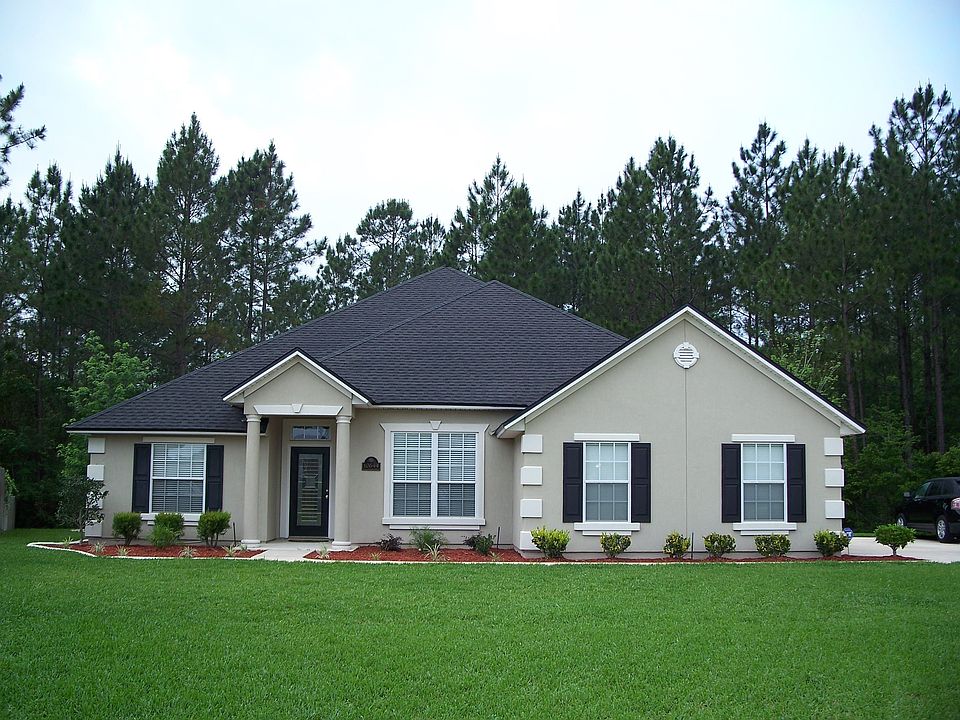 Beautiful lot on cul-de-sac almost a full acre that backs up to the woods!