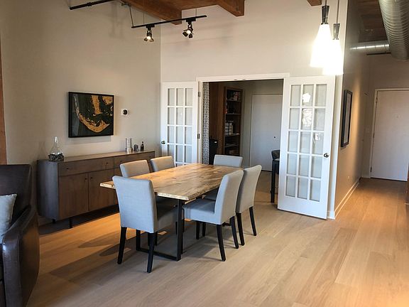 Dining Area + French Doors to Second Bedroom