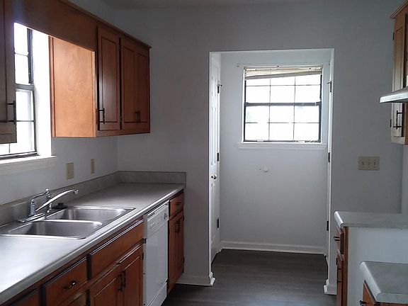 View of Kitchen - Garage stairway access to end right