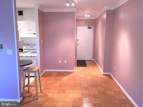 View from the window to the front door. Remember, the floors are no longer parquet; they're oak strips.