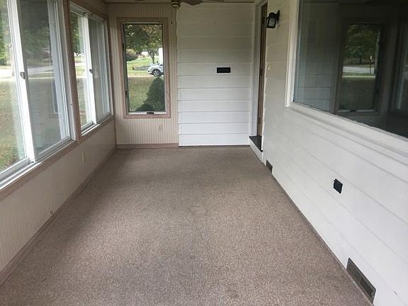 ENCLOSED FRONT PORCH