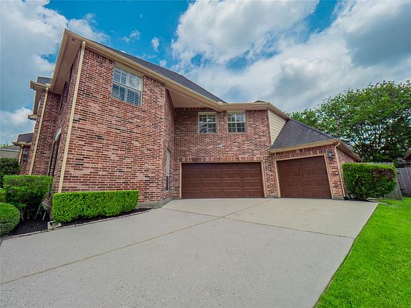 Well appointed and meticulously maintained home! Fantastic double wide driveway with three car garage.