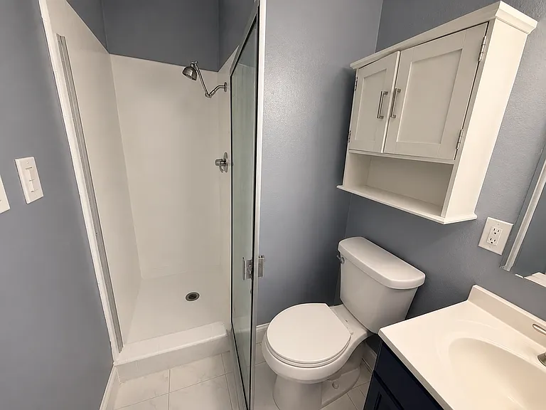 Primary bathroom with walk-in shower