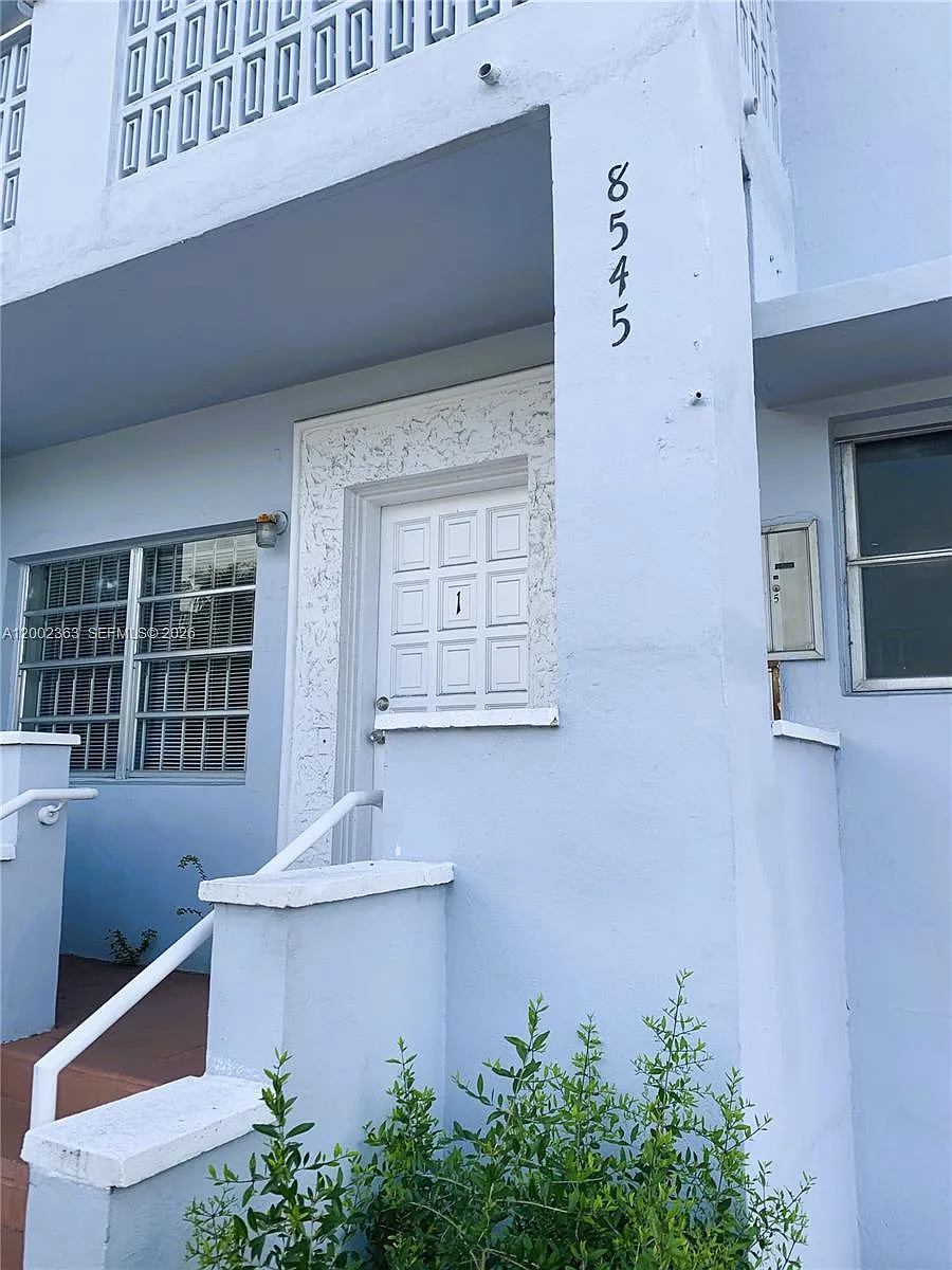 Building Photo - 8545 Harding Ave #5