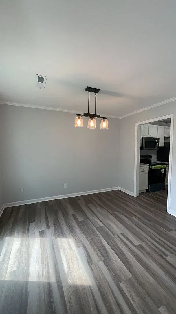 Beautifully renovated three-bedroom, two-bathroom brick ranch — Photo 4