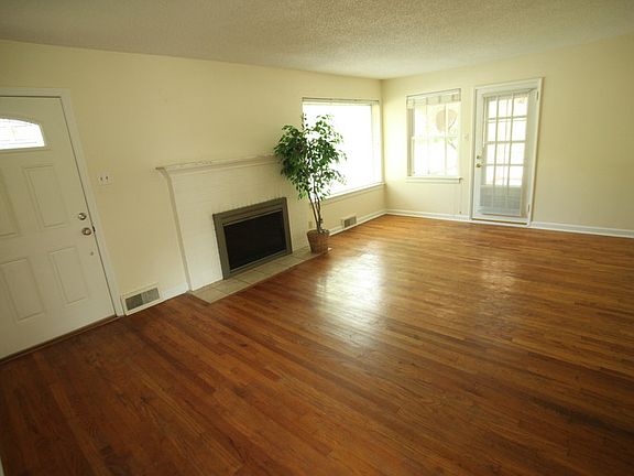 Living Room
						:
						Fireplace, hard wood floors, meticulously maintained.